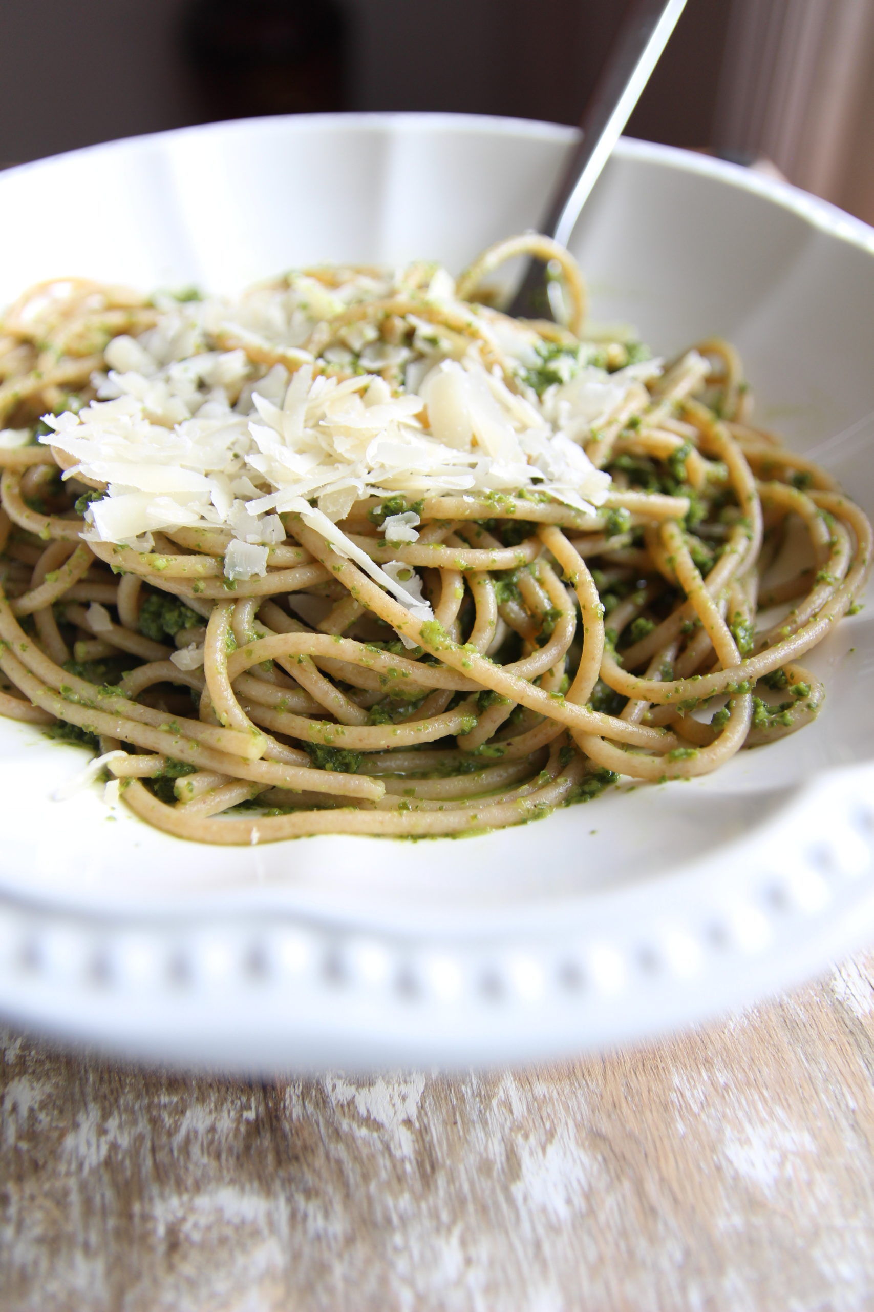 Pasta with green pesto and parmesan