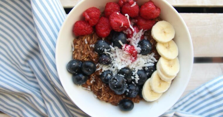 Chocolate and coconut oats with raspberries, blueberries and banana